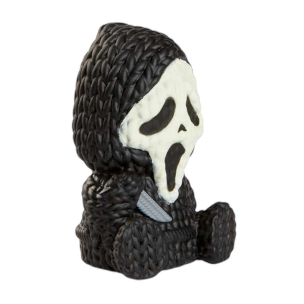 Glow-in-the-dark Ghost Face vinyl toy figure, 1 3/4-inch micro handmade by Robots, detailed Halloween-themed collectible toy.